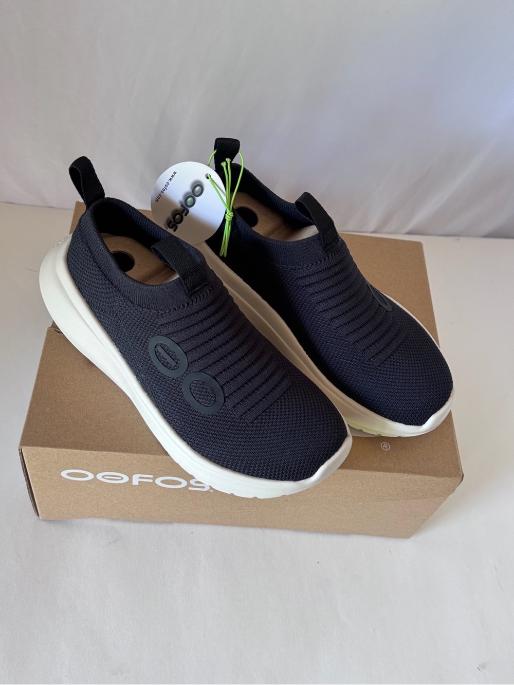 OOFOS Men’s Black Slip-On Knit Recovery Shoe with White Sole